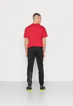 Ellesse OUVA - Pantalon De Survêtement - Black -Ellesse Boutique 2ab7810b11d440ffa47ded0423d2495a