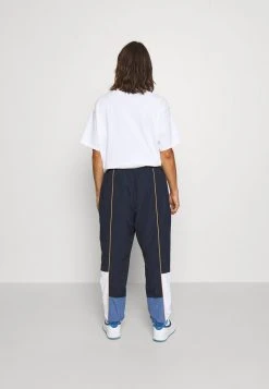 Ellesse ACER TRACK PANT - Pantalon Classique - Navy -Ellesse Boutique 731be697b5d849ca91687b8fd9c6a8b2