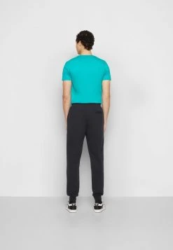 Ellesse SAMIE - Pantalon De Survêtement - Black -Ellesse Boutique 8c6d9be67b8d4a1ea4d07a0b219ba721