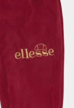 Ellesse KAYTEE FLARED - Pantalon De Survêtement - Burgundy -Ellesse Boutique bb95532a21c0435eaa01fc34db464f66