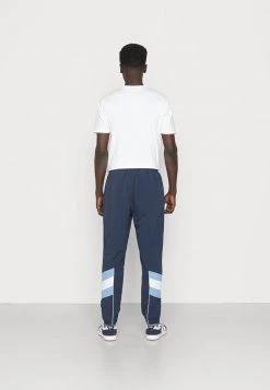 Ellesse MINUTI TRACK TOP - Pantalon De Survêtement - Navy -Ellesse Boutique c73e75632e5c4d358fb12f4fd5aa30cd