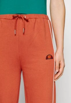 Ellesse AMITI PANT - Pantalon De Survêtement - Dark Orange -Ellesse Boutique d84f744dc05142218d066ebebc57d788